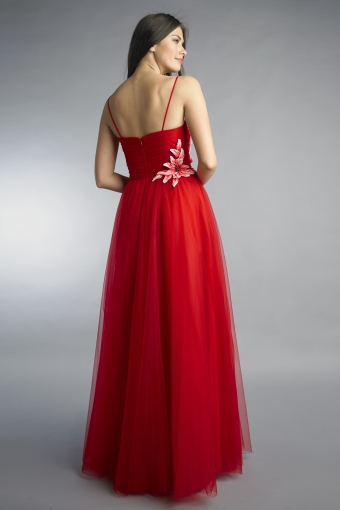 Spaghetti strap gown with floral accent